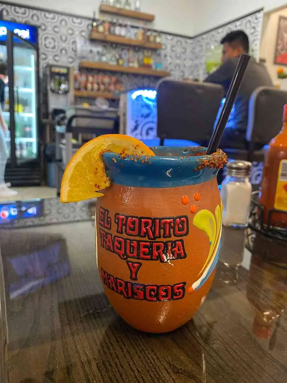 A cantarito in an El Torito clay cup