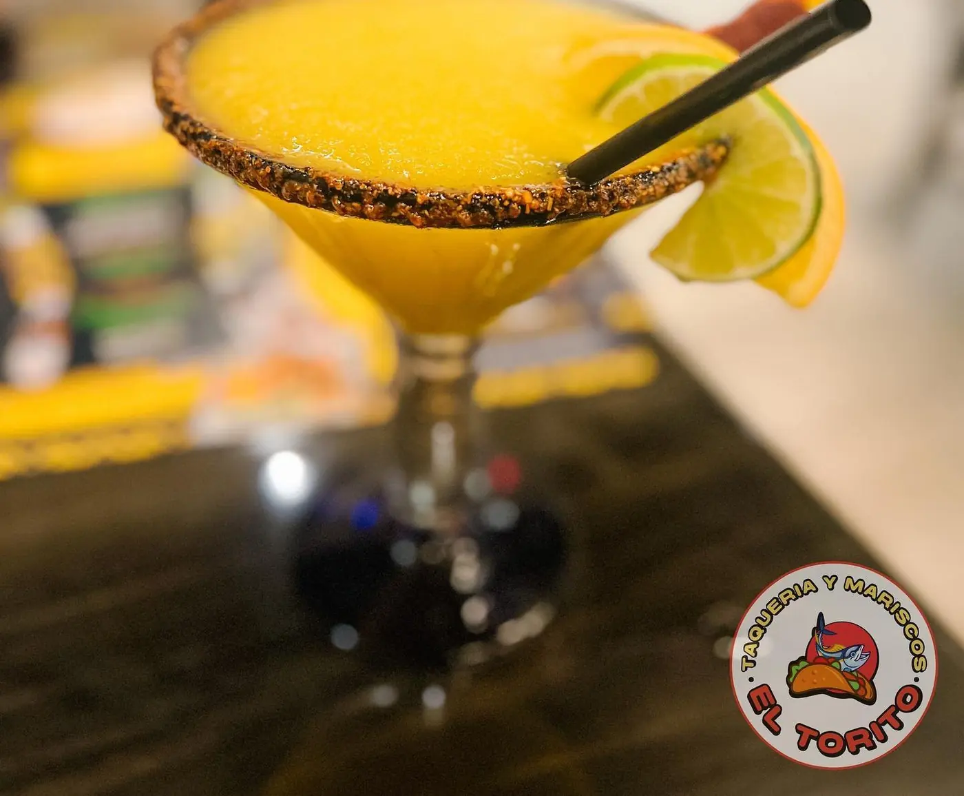 A mango margarita with a chile rim