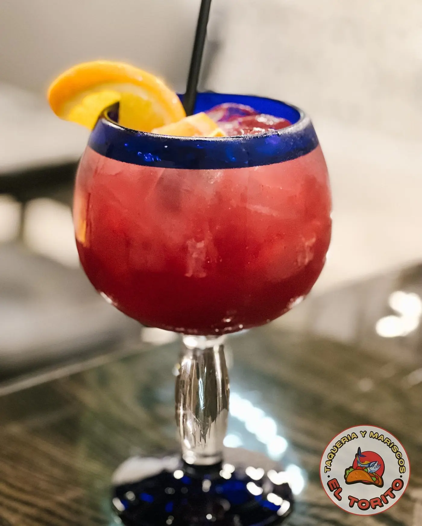 Sangria in a cobalt-rimmed glass